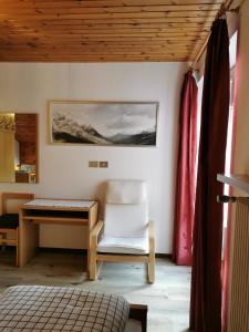 Postel nebo postele na pokoji v ubytování Apartments Steger Sand in Taufers Campo Tures