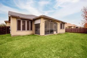 a house with a green lawn in front of it at Randolph Central Location, 1-story, Chef Kitchen, Creekside in Selma