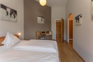 Łóżko lub łóżka w pokoju w obiekcie Appartement Schneider by Schladming-Appartements