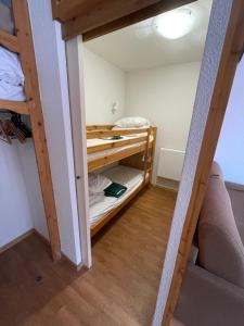 Postel nebo postele na pokoji v ubytování Studio Orelle 3 Vallées - Spa & Piscine - Apt 006