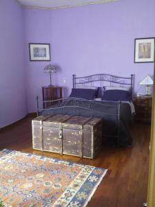 Un pat sau paturi într-o cameră la B&B Villa Patrizia