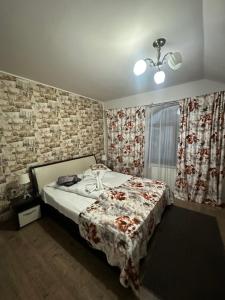 Postel nebo postele na pokoji v ubytování Pensiunea Casa Simoni