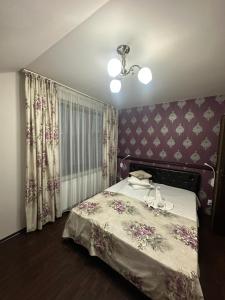 Postel nebo postele na pokoji v ubytování Pensiunea Casa Simoni