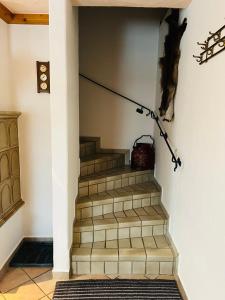 a set of stairs in a house at Hexen Haus in Oberau