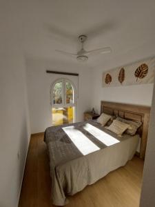 En eller flere senge i et værelse på Bungalow Alkabir con vistas al mar + 40 billeder