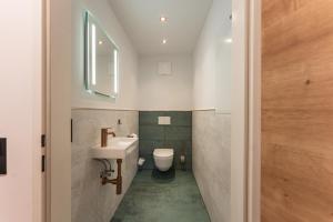 A bathroom at Villa Waluliso by Schladming-Appartements