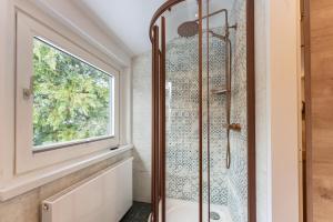 A bathroom at Villa Waluliso by Schladming-Appartements