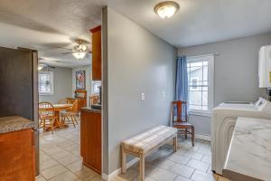 a kitchen and living room with a table at Lecompton Vacation Rental about 10 Mi to Clinton Lake! in Lecompton