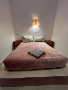 Łóżko lub łóżka w pokoju w obiekcie Appartement With Two Rooms In Ksar Ait Ben Haddou