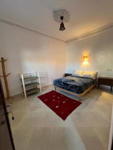 Giường trong phòng chung tại Appartement With Two Rooms In Ksar Ait Ben Haddou