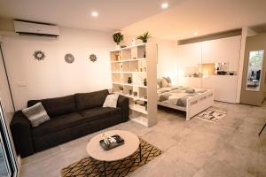 Et sittehjørne på Merveilleux studio cosy vue mer - piscine