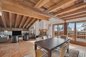 a dining room with a table and chairs at Magnificent flat in Crans-Montana - 856 in Crans-Montana