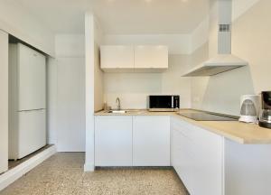 Kuchyň nebo kuchyňský kout v ubytování Lago del Drago