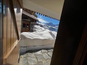 Posteľ alebo postele v izbe v ubytovaní Haut Belle Plagne, vue montagnes, au pied des pistes, proche de l'ESF & espace piscine inclus