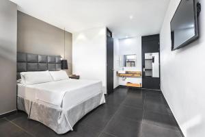 Hotel Cartagena DC客房内的一张或多张床位