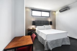 Hotel Cartagena DC客房内的一张或多张床位