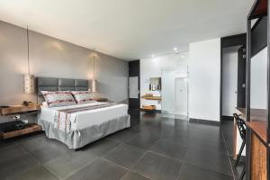 Hotel Cartagena DC客房内的一张或多张床位