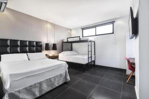 Hotel Cartagena DC客房内的一张或多张床位