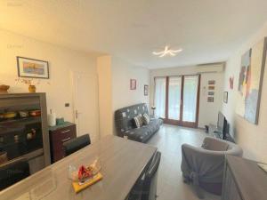 Posedenie v ubytovaní 4PA109 Appartement F2 résidence avec piscine parking et cours de tennis