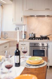 A kitchen or kitchenette at Corso Emanuele Apartments