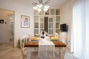 A television and/or entertainment centre at Corso Emanuele Apartments