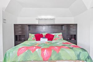 Katil atau katil-katil dalam bilik di Cocoplum Rest N Hideaway #2