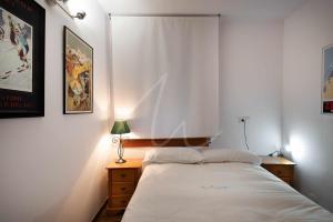 A bed or beds in a room at Bonaigua 006 by SeaMount Rentals