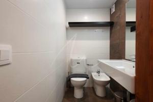 A bathroom at Bonaigua 006 by SeaMount Rentals