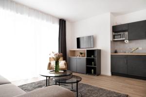 Kuchyň nebo kuchyňský kout v ubytování Schicke Apartments in Osnabrück I private Parkplätze I home2share