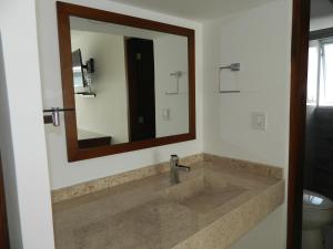 Baðherbergi á ACL Suites