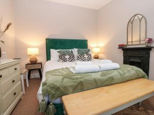 Voodi või voodid majutusasutuse Harker View Cottage toas