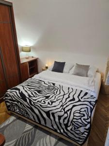 Postel nebo postele na pokoji v ubytování Hostel Wielka Krokiew