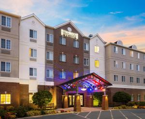 a rendering of the front of a hotel at Staybridge Suites Rochester University, an IHG Hotel in Rochester