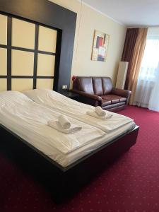 Posteľ alebo postele v izbe v ubytovaní Apartament prywatny w Hotelu Diva SPA