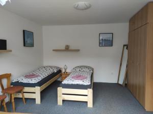 Postel nebo postele na pokoji v ubytování Apartmán Lanžhot