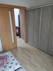 Postel nebo postele na pokoji v ubytování Apartmán Lanžhot