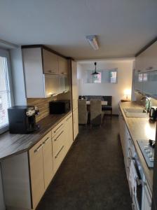 Kuchyň nebo kuchyňský kout v ubytování Apartmán Lanžhot