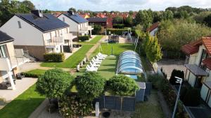 an aerial view of a house yard with a pool at SIEDEM WYDM in Rowy