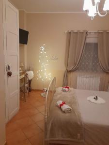 Una cama o camas en una habitación de B&B IL CASALETTO