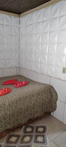 Cama o camas de una habitación en Kitnet mobiliada, quarto, banheiro, cozinha americana
