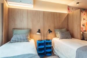 Postel nebo postele na pokoji v ubytování Diseño en Punta Carretas