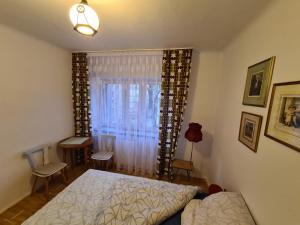 Posteľ alebo postele v izbe v ubytovaní MirrorRoom PL Downtown