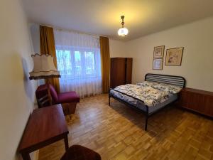Posteľ alebo postele v izbe v ubytovaní MirrorRoom PL Downtown
