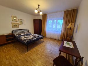 Posteľ alebo postele v izbe v ubytovaní MirrorRoom PL Downtown