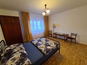 Posteľ alebo postele v izbe v ubytovaní MirrorRoom PL Downtown