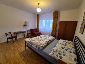 Posteľ alebo postele v izbe v ubytovaní MirrorRoom PL Downtown
