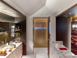 a lobby with a sign that says you are a last war at Baccarat Hotel and Residences New York in New York