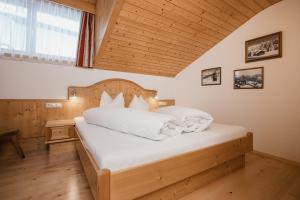 Posteľ alebo postele v izbe v ubytovaní Apart Tyrol inkl der SUPER SOMMER CARD im SOMMER 2025