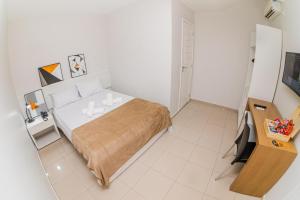 Postel nebo postele na pokoji v ubytování Hotel Rochedo, Penedo - Alagoas
