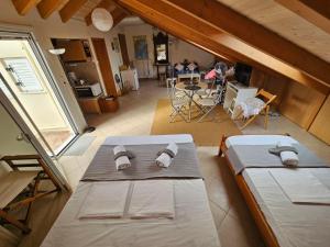 A bed or beds in a room at AB Preveza Apartments -15 Meters Over the Sea